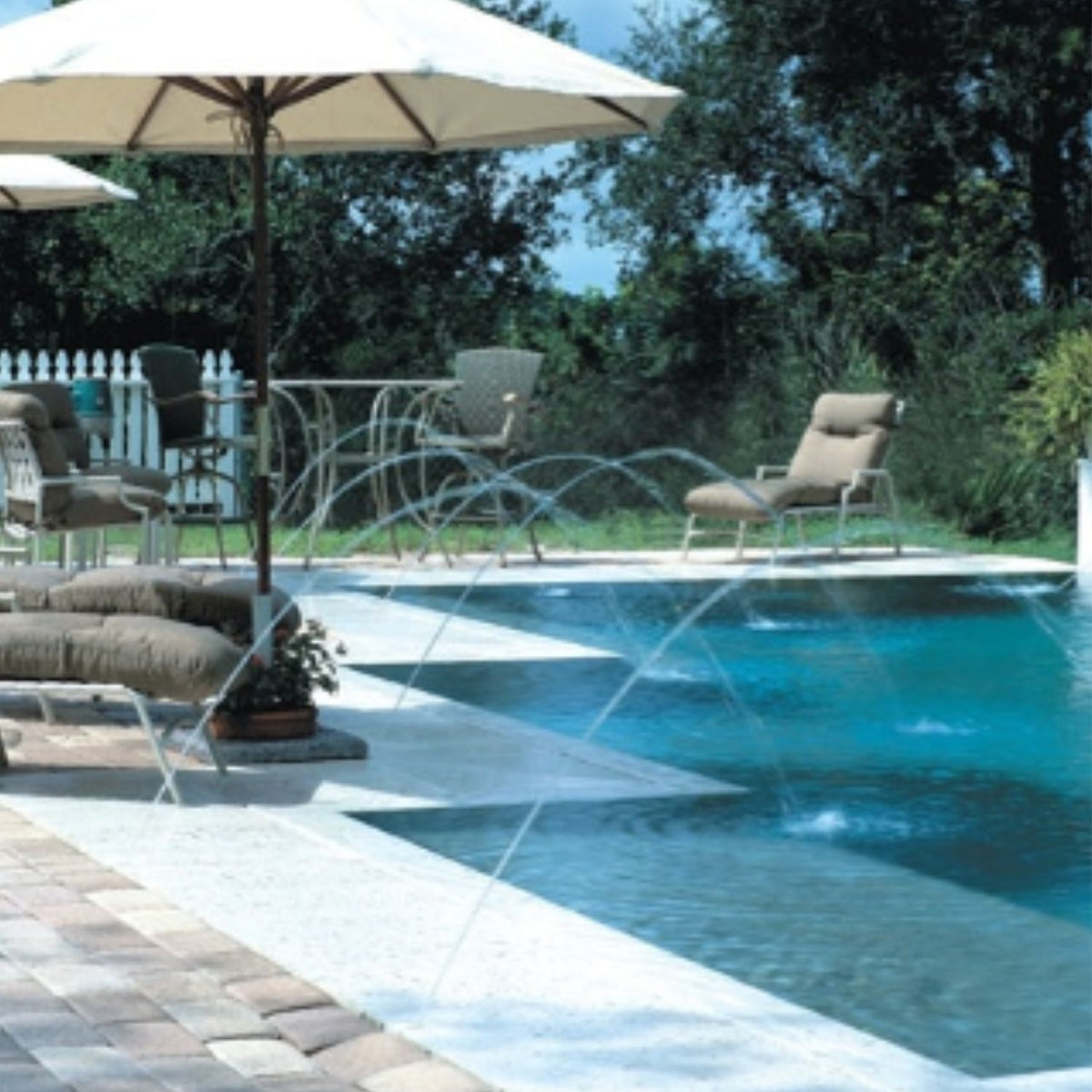 Jandy FCMJ1000 Flow Control Mini Jet 4-pack with brass nozzles and white cover plates for professional pool contractors